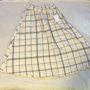 XS WOMENS LONG SKIRT. OFF-WHITE IN COLOR. A NEW DAY BRAND